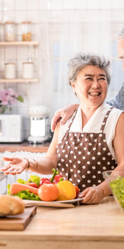 couple senior asian elder people cook salad dish w 2022 01 19 00 14 44 utc min