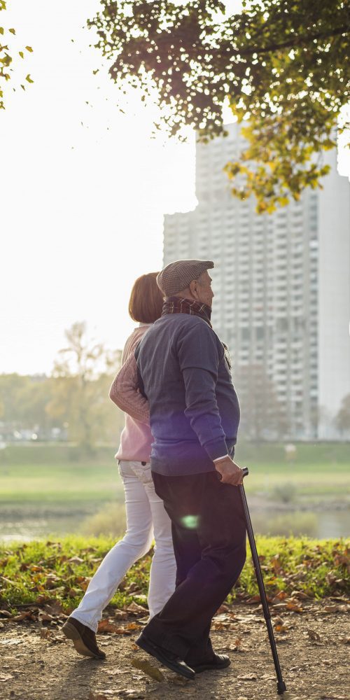 daughter and senior man walking by the riverside 2022 03 08 01 33 50 utc min