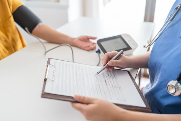 doctor checking patient arterial blood pressure 2023 11 27 05 01 33 utc 1