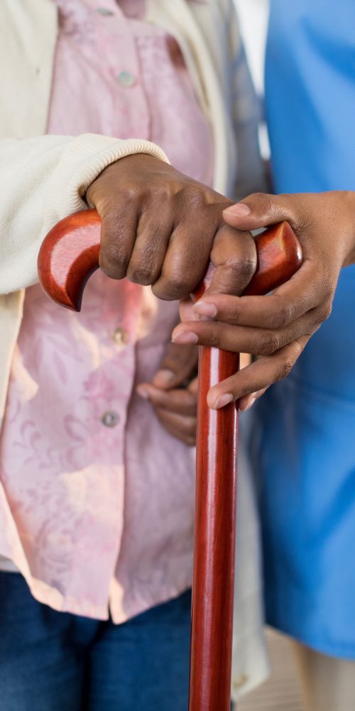 female doctor helping senior woman to walk with wa 2021 08 28 16 47 17 utc min