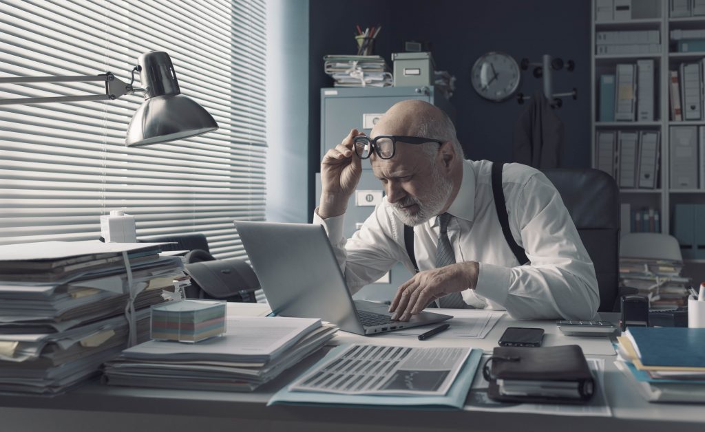 office worker having vision problems D9RJPLT min