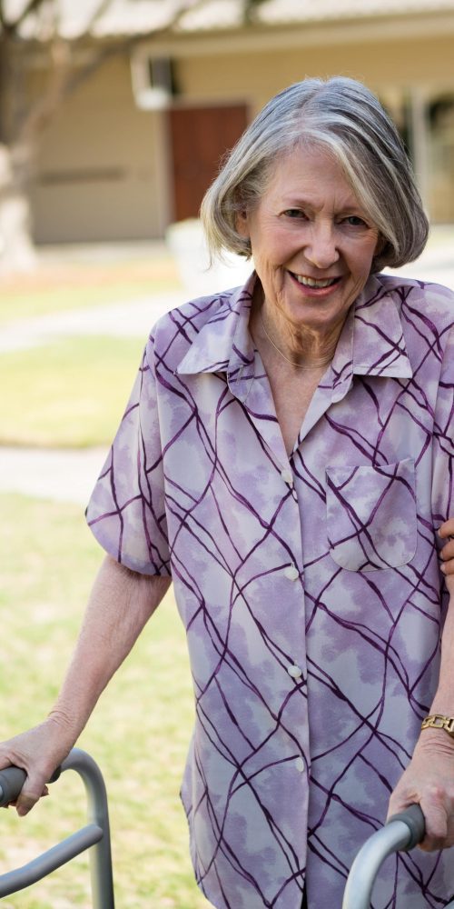 portrait of doctor helping senior woman in walking 2021 08 28 22 12 44 utc min