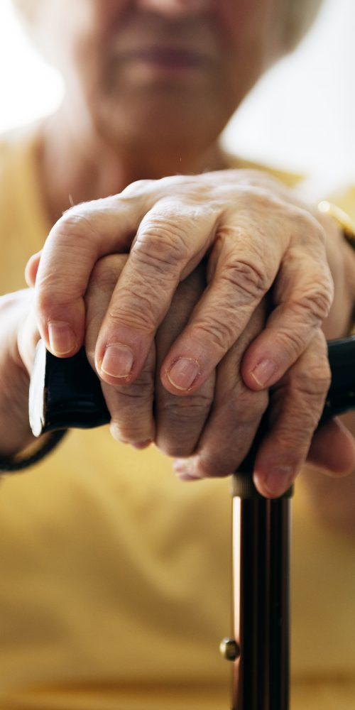 senior woman holding a walking stick 2021 08 27 00 02 50 utc min